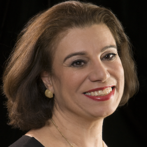 Headshot of a woman smiling.